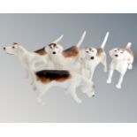 Five Beswick beagles. CONDITION REPORT: One with broken tail.