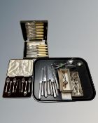 A tray of boxed and unboxed EPNS cutlery,