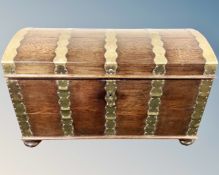 A 19th century Scandinavian brass bound oak dome top blanket chest.