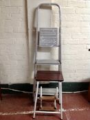 An aluminium step ladder and further stool.