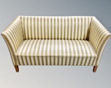 An early 20th century Scandinavian two seater hall settee in striped two-tone fabric, width 140 cm.