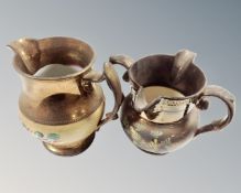 Two antique copper lustre jugs