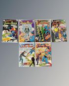 Six of vintage DC Superman's Pal Jimmy Olsen comics, in plastic covers.