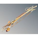 A bundle of tribal bows and arrows,