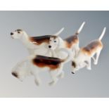 Four Beswick beagles.