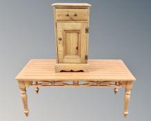 A pine pot cupboard fitted a drawer together with a contemporary pine coffee table