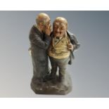 An early 20th century German Johann Maresch painted pottery figure depicting two gentlemen in