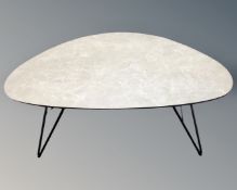 A retro style pebble coffee table on hairpin legs.