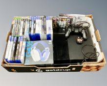 A box of Sony Playstation 4 with lead controller and games,