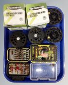 A tray containing two Ron Thompson Dynadisc Pro fly reels with spools together with two cases