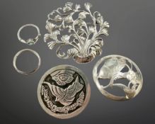 Two silver brooches, another floral brooch and two rings. (5) CONDITION REPORT: 33.