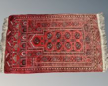 A Bokhara prayer rug, Afghanistan, 130cm by 80cm.