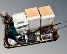 A box containing Sony HiFi, vintage cameras, two golf drivers.