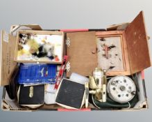 A box containing fishing equipment including Jarvis Walker reel, cases containing fishing flies,