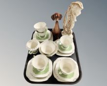 A twenty piece Tams Ware Glengarry Art Deco tea service together with a porcelain Dutch figure of a