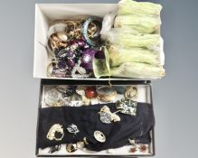 A tray of a quantity of costume brooches,