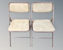 A pair of mid-20th century folding Samsonite metal framed chairs.