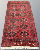 A Bokhara rug, Afghanistan, 212cm by 120cm.