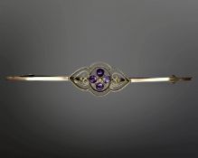 A 9ct gold amethyst bar brooch, length 62mm. CONDITION REPORT: 2.