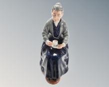 A Royal Doulton figure, The Cup of Tea HN2322.