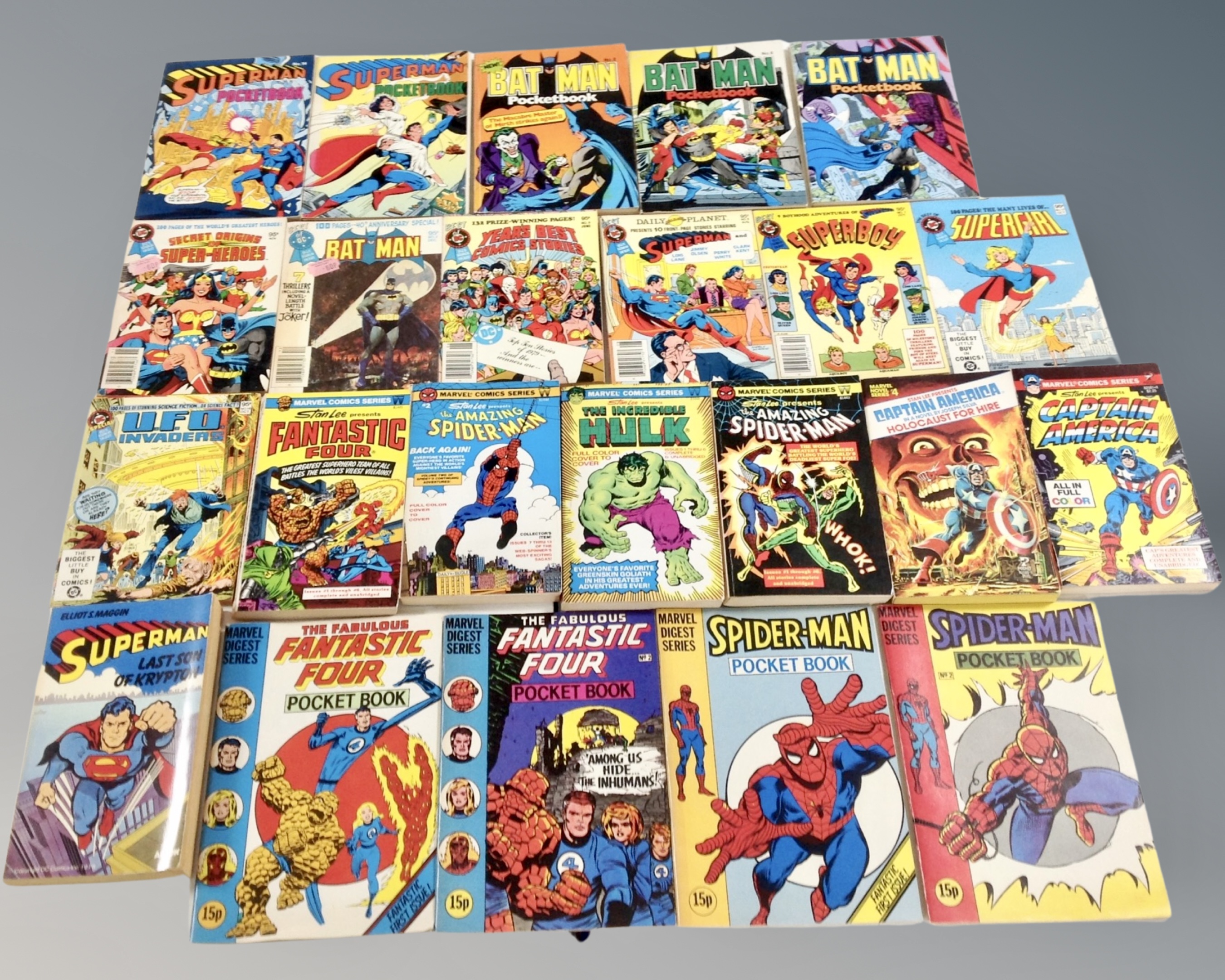 A box containing assorted Marvel and DC pocket books, Marvel digests and over size comics.