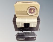 A Bakelite cased radio together with two further radios by Bush and Panasonic.