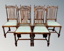 A set of six carved oak barley twist dining chairs