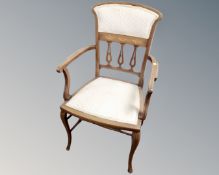 A 19th century mahogany satinwood inlaid open armchair