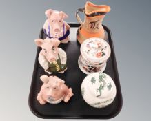 A tray containing three Wade Natwest pigs,
