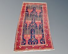 A Kurdish rug, North-West Iran, 194cm by 105cm.