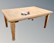 A 19th century oak wind-out dining table