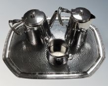 A four piece Old Hall stainless steel pewter tea service on tray.