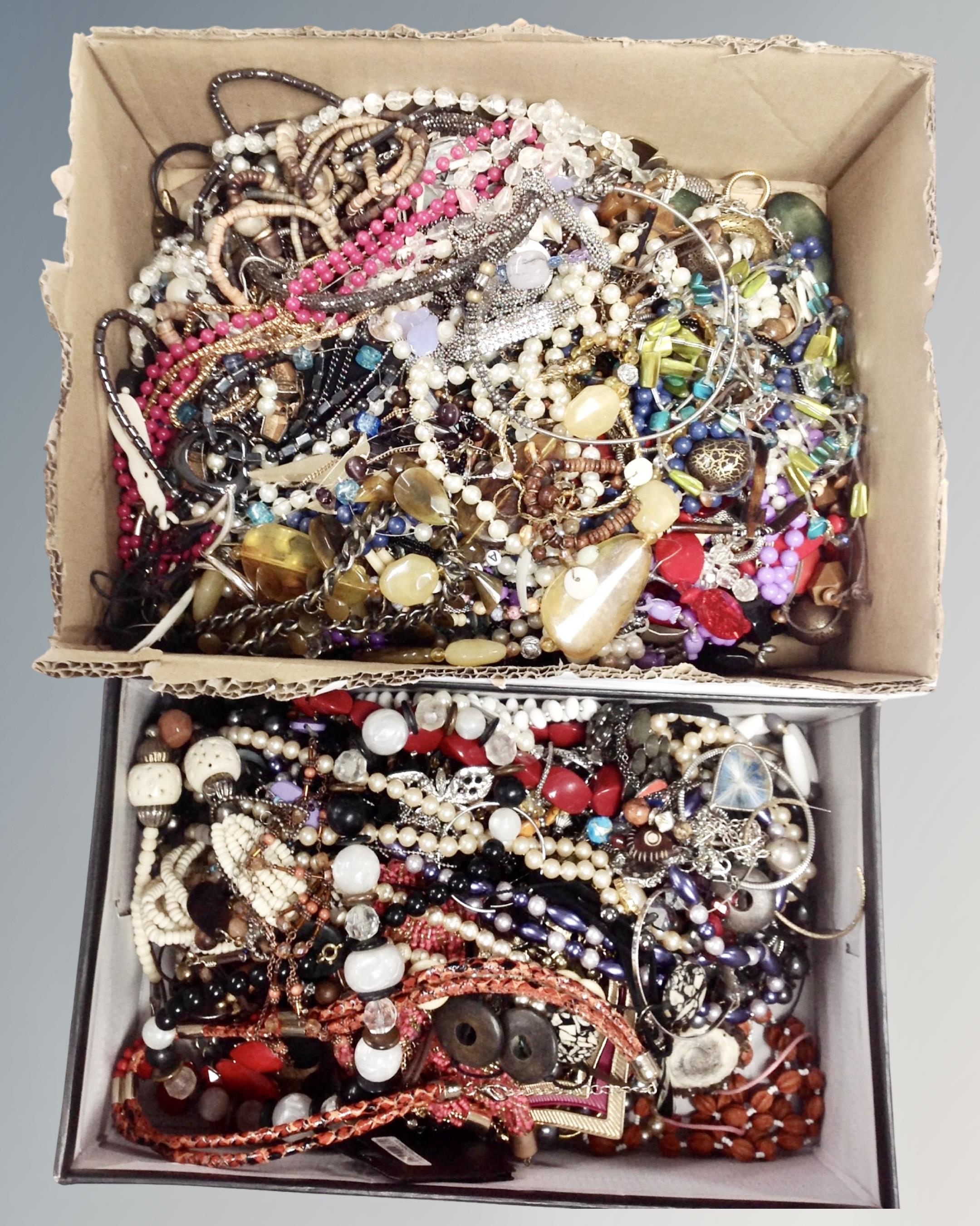 A tray containing a large quantity of costume jewellery.