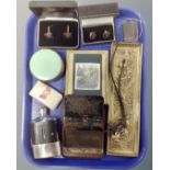 A tray containing cufflinks, a brass embossed pen tray, hip flask, dressing table pot,