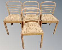 A set of four beech Art Deco style dining chairs