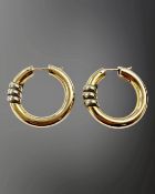 A large pair of 9ct gold two-tone hoop earrings, diameter 29mm. CONDITION REPORT: 7.