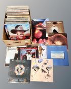 A box of vinyl records to include Free, Kate Bush, ACDC, Deep Purple, The Eagles,