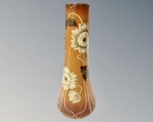 An antique hand painted English floral pottery vase.