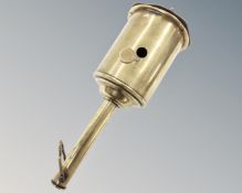 A 19th century brass spit