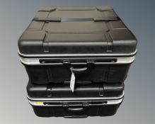 Two B & W hard shell luggage cases for folding bikes, 65cm by 60cm by 30cm.