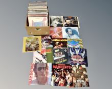 A box of vinyl records to include Hawk Wind, Jimi Hendrix, Kiss, Rolling Stones,