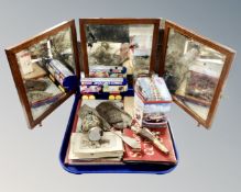 A tray of miscellany to include vintage postcards, antique triptych mirror, tins to include Butlins,