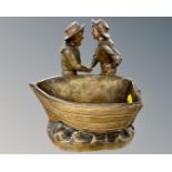 A German Johann Maresch figure group planter depicting two sailors by a boat, stamped BU533.