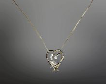 A 9ct yellow gold necklace with two-tone heart shaped pendant, 1.5g.