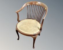 A 19th century inlaid mahogany open elbow chair