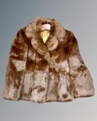 A brown mink fur jacket.