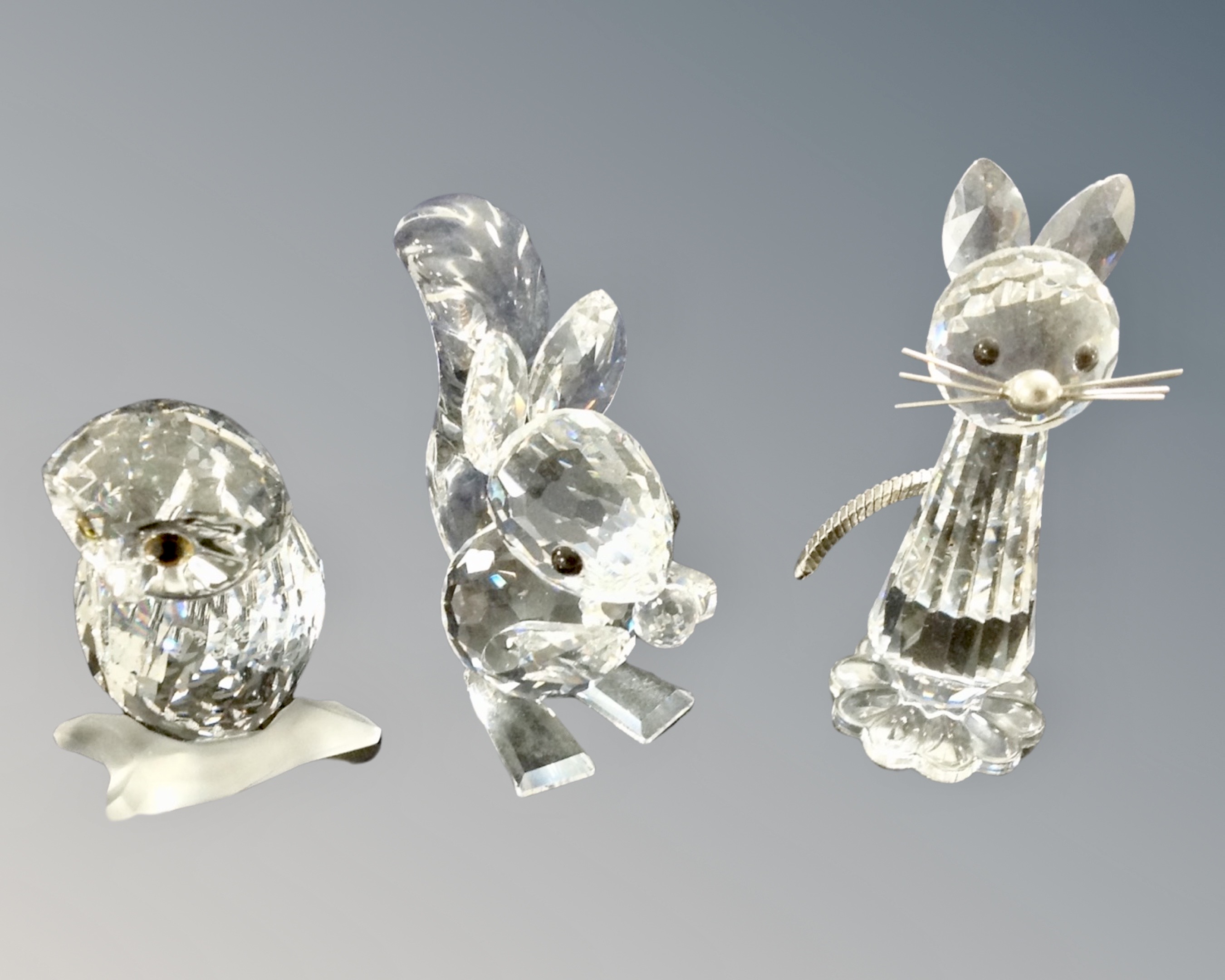 Three boxed Swarovski Crystal ornaments : owl,