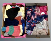 Two boxes containing lady's scarves and woolen bobble hats.