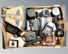 A box of assorted cameras, camera bags,