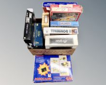 A box containing board games including Cluedo, Trivial Pursuit,